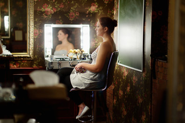 Young beautiful woman at a make-up studio