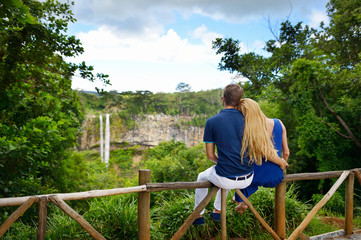 Young couple enjoying a view on Chamarel falls