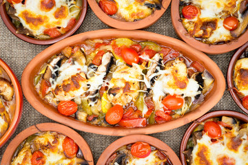 Chicken Stews in stoneware cups served together on the table