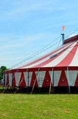 Circus tent on village green.