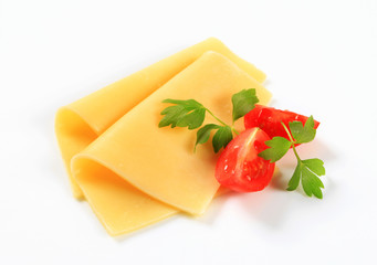 Sliced cheese and tomato wedges