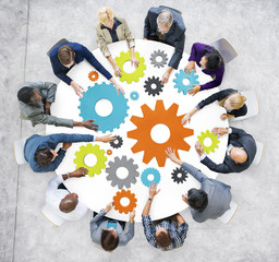 Business People with Gears and Teamwork Concept