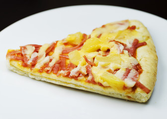 Close up of Pizza Hawaiian piece