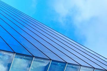 Abstract view of modern blue glass business center