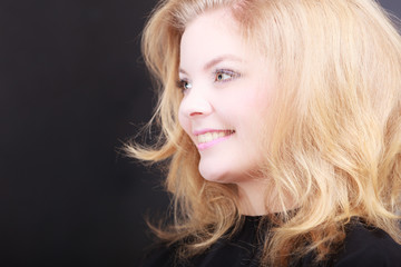 Naklejka premium Beautiful blond girl client by hairdresser in hair beauty salon