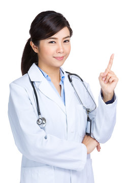 Female dotor with finger point up