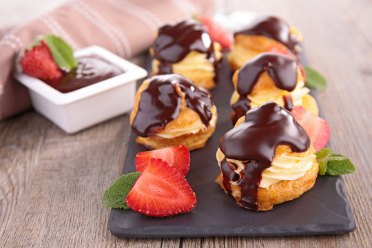 Choux Pastry With Cream And Chocolate