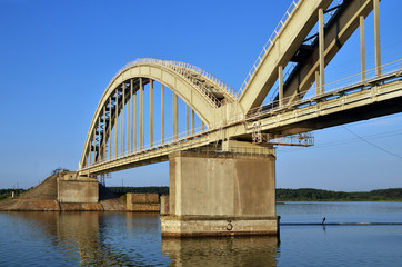 Fototapeta na wymiar a big bridge through the river