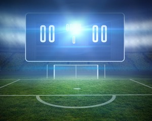 Football pitch with goalpost and scoreboard © WavebreakMediaMicro