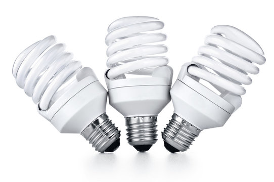 Energy saving fluorescent light bulb on white bakground - Powered by Adobe