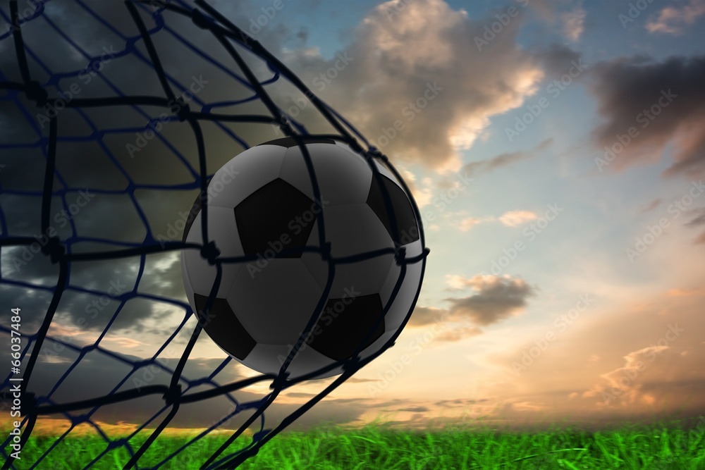 Poster Composite image of football in back of the net