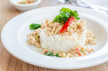 Spicy fried chicken with basil and rice
