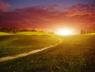 Fantastic sunset over summer green hills, abstract environmental