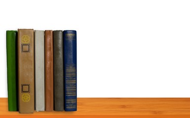Books on wood shelf