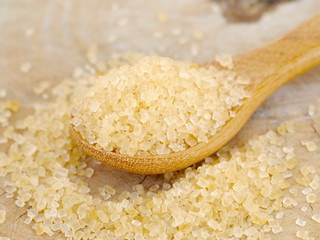 brown sugar heap on wooden table old retro vintage style