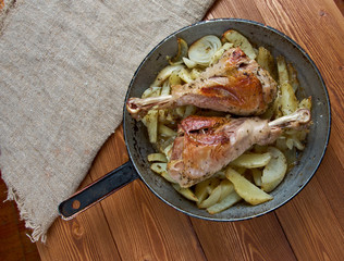 Turkey leg with baked  potatoes