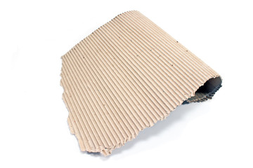 Torn corrugated cardboard on white