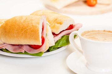 Panini sandwich with ham, cheese and tomato