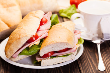 Panini sandwich with ham, cheese and tomato