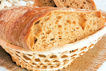 the cut bread in a wattled basket
