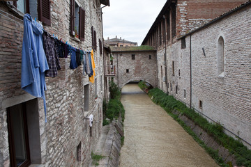 Fototapeta na wymiar The Camignano, a small stream which crosses Gubbio.