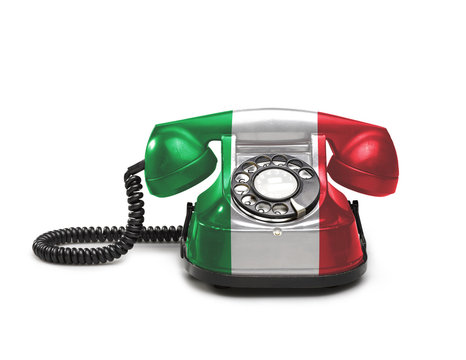 Office: old and vintage telephone with the Italy flag