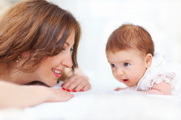 Obraz na płótnie Canvas happy woman enjoying motherhood