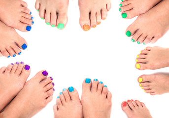 womens legs and nails isolated on the white background