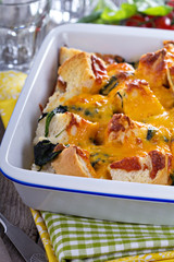 Spinach, bread and cheese strata