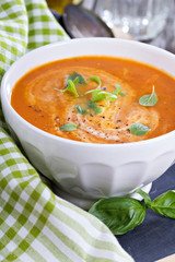 Tomato soup in white bowl