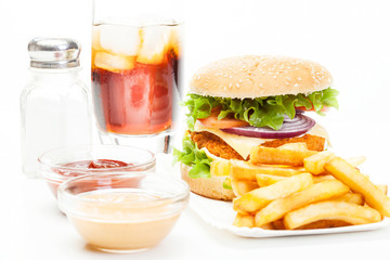 Chickenburger and glass of cola with ice