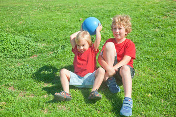 Little boy throws a ball