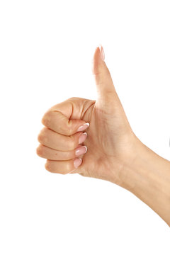 Beautiful female hand making thumb up gesture