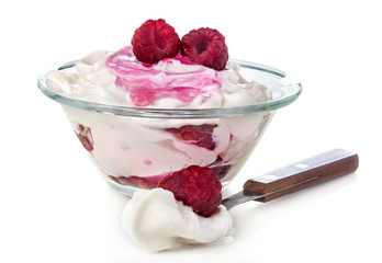 fresh raspberries in sweet sour cream on a white background