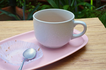 Eaten cake with tea in garden