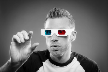 Man wearing 3d glasses in black and white