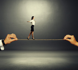 assured woman walking on the rope