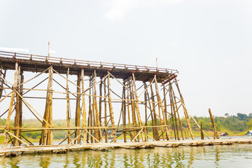 The old wooden bridge across the river and Wood bridge, Sangklab