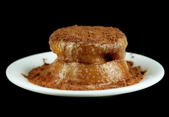 Yummy chocolate cake on black background