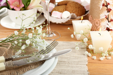 Table setting with spring flowers close up