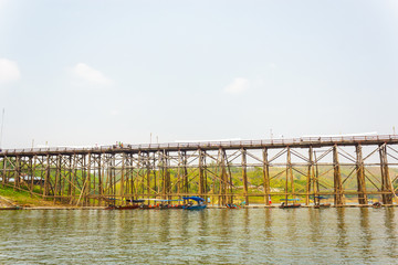 The old wooden bridge across the river and Wood bridge, Sangklab
