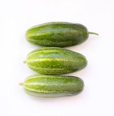 Fresh cucumbers on white background