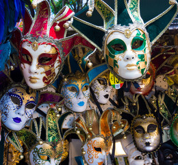 Various venetian masks on sale .  colorful artistic masks on the