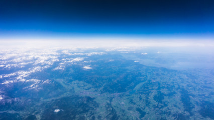 Fototapeta na wymiar Landscape of Mountain. view from the airplane window . height of