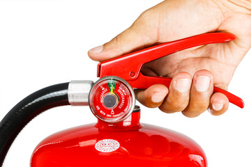 Hand holding fire extinguisher isolated on white background, with clipping path