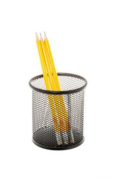 black pencil holder with pencils isolated on white background