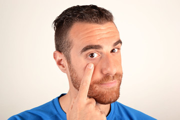 Man pointing his finger eye