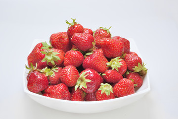 strawberries on white plate