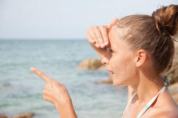 woman standing on the beach