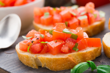 Italian bruschetta with tomatoes and basil
